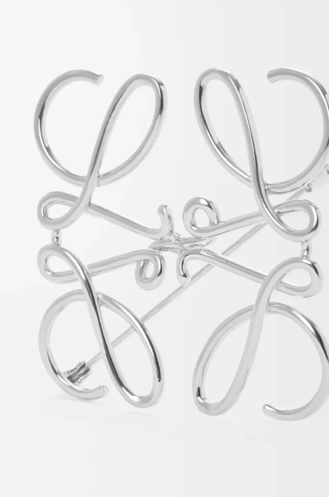 Anagram brooch in metal Palladium