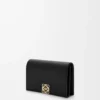 Anagram business cardholder in pebble grained calfskin Black/Gold