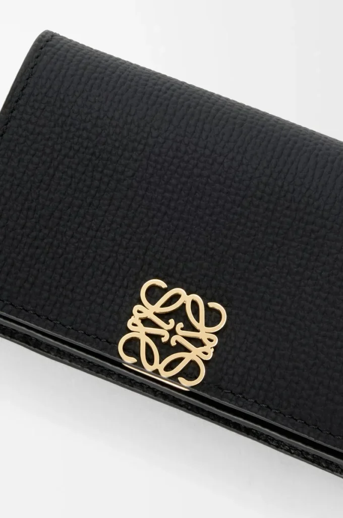 Anagram business cardholder in pebble grained calfskin Black/Gold