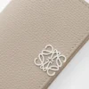 Anagram business cardholder in pebble grained calfskin Clay