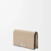 Anagram business cardholder in pebble grained calfskin Sand