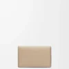 Anagram business cardholder in pebble grained calfskin Sand