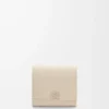 Anagram compact flap wallet in pebble grained calfskin Light Ghost