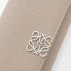 Anagram key case in pebble grained calfskin Clay