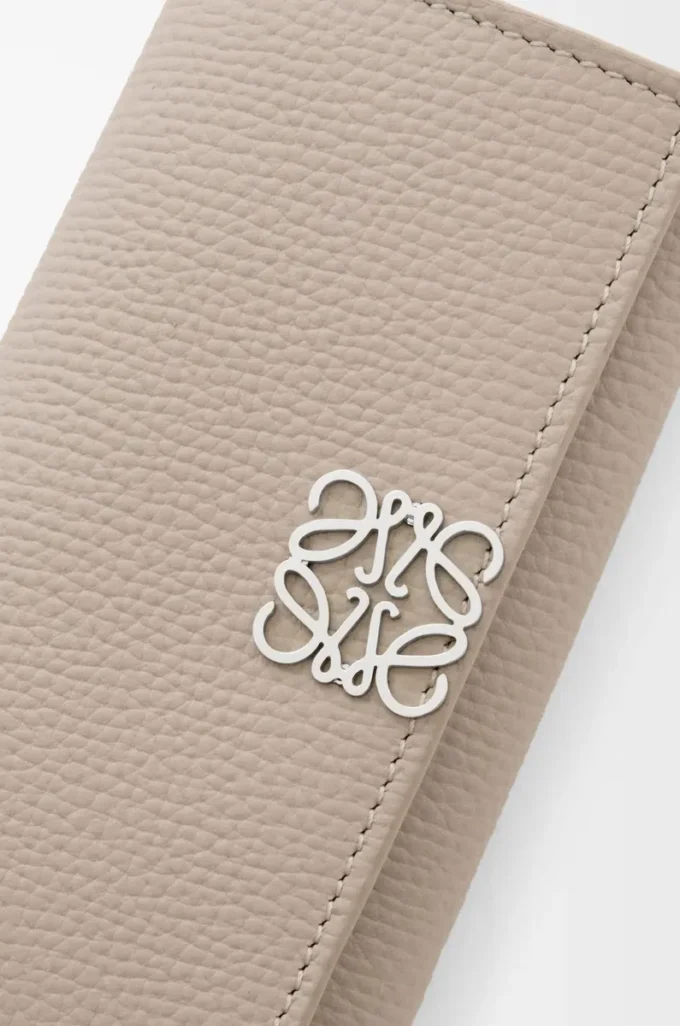 Anagram key case in pebble grained calfskin Clay