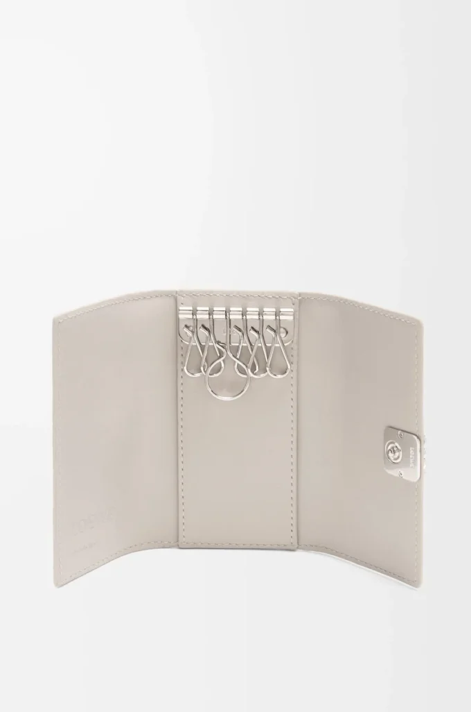 Anagram key case in pebble grained calfskin Light Ghost Anagram key case in pebble grained calfskin Light Ghost