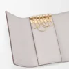 Anagram key case in pebble grained calfskin Light Ghost Grey Anagram key case in pebble grained calfskin Light Ghost Grey