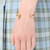Anagram Pebble cuff in sterling silver Gold