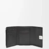 Anagram small vertical wallet in pebble grained calfskin Black