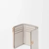 Anagram small vertical wallet in pebble grained calfskin Light Ghost Grey