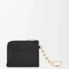 Anagram square coin cardholder in pebble grained calfskin Black/Gold Anagram square coin cardholder in pebble grained calfskin Black/Gold