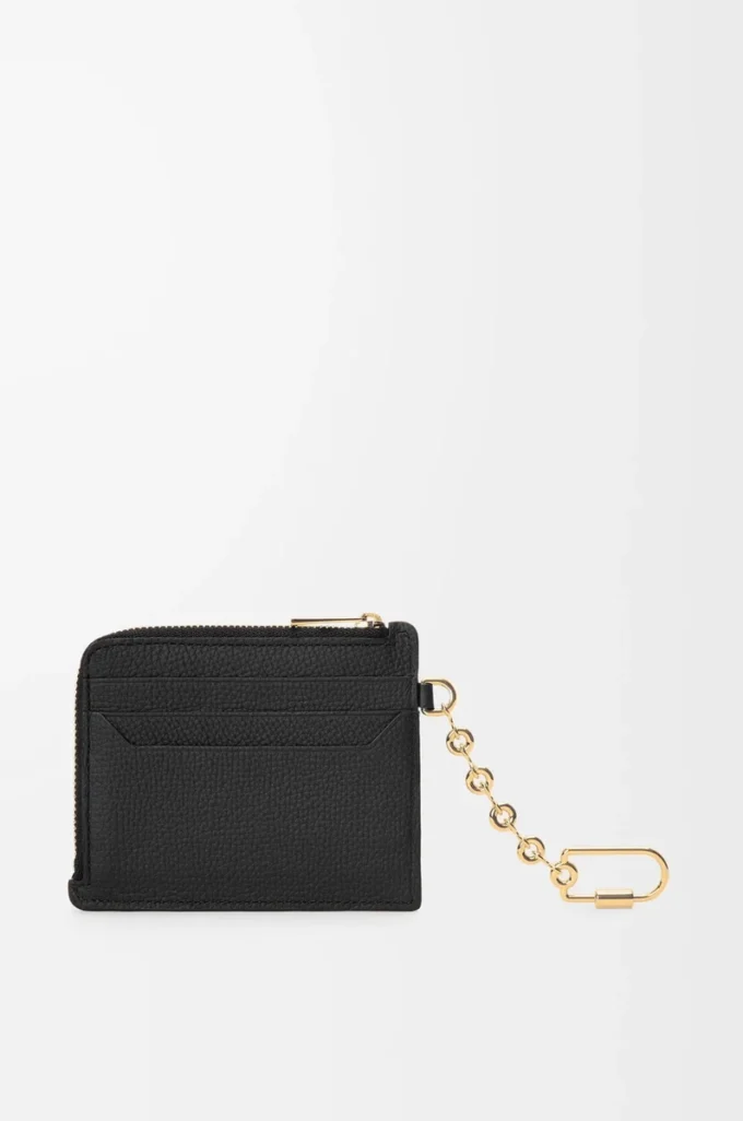 Anagram square coin cardholder in pebble grained calfskin Black/Gold Anagram square coin cardholder in pebble grained calfskin Black/Gold