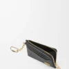 Anagram square coin cardholder in pebble grained calfskin Black/Gold Anagram square coin cardholder in pebble grained calfskin Black/Gold
