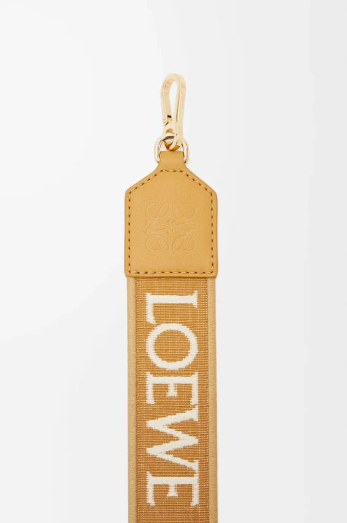 Anagram strap in jacquard and calfskin Sahara
