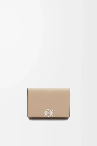 Anagram trifold wallet in pebble grained calfskin Sand Anagram trifold wallet in pebble grained calfskin Sand