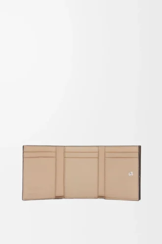 Anagram trifold wallet in pebble grained calfskin Sand Anagram trifold wallet in pebble grained calfskin Sand