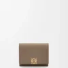 Anagram trifold wallet in pebble grained calfskin Taupe Anagram trifold wallet in pebble grained calfskin Taupe
