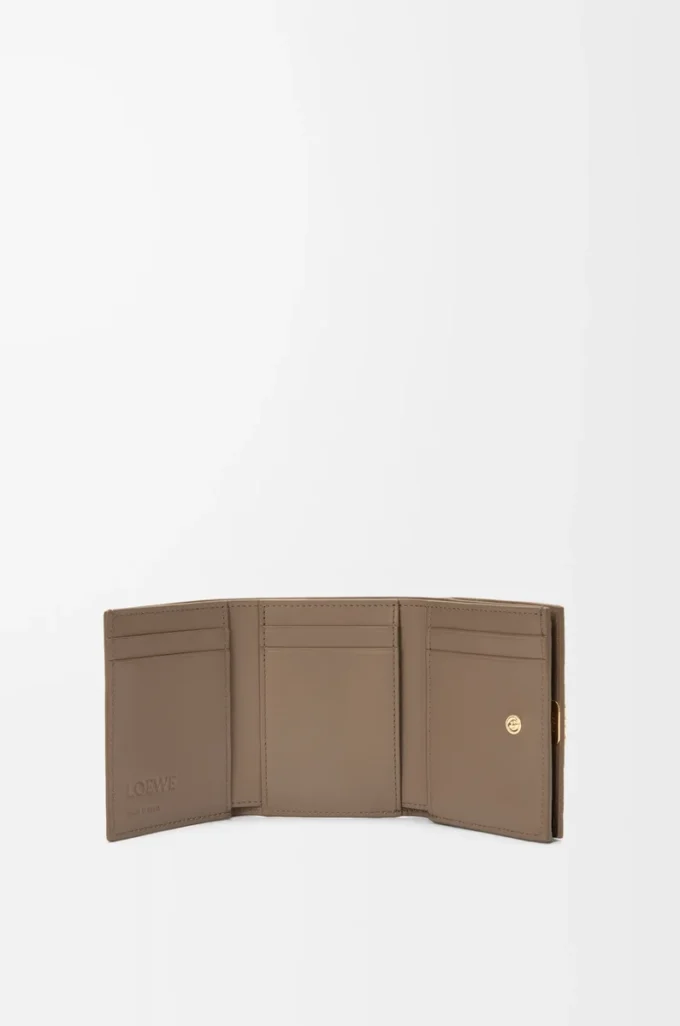 Anagram trifold wallet in pebble grained calfskin Taupe Anagram trifold wallet in pebble grained calfskin Taupe