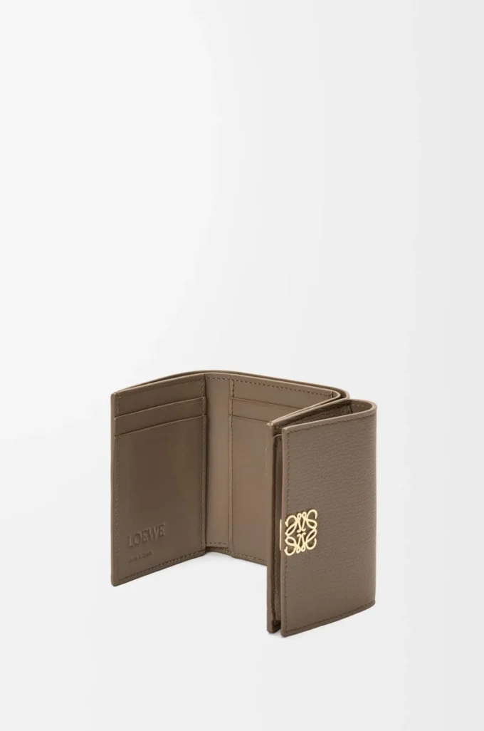 Anagram trifold wallet in pebble grained calfskin Taupe Anagram trifold wallet in pebble grained calfskin Taupe