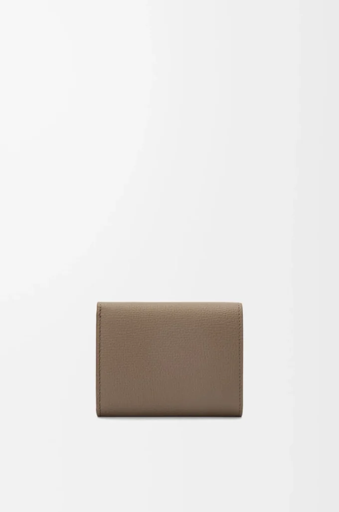 Anagram trifold wallet in pebble grained calfskin Taupe Anagram trifold wallet in pebble grained calfskin Taupe