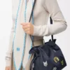 Cats medium Flamenco clutch in embroidered denim Blue