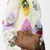 Cats mini Flamenco clutch in nappa calfskin Mocha
