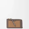 Coin cardholder in soft grained calfskin Taupe/Gold Coin cardholder in soft grained calfskin Taupe/Gold