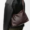 Cubi crossbody bag in supple grained calfskin Oxblood