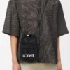 Drawstring pocket in raffia Black