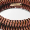 Interlock bangle in classic calfskin Tan