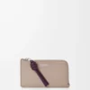 Knot coin cardholder in shiny nappa calfskin Clay/Plum Knot coin cardholder in shiny nappa calfskin Clay/Plum