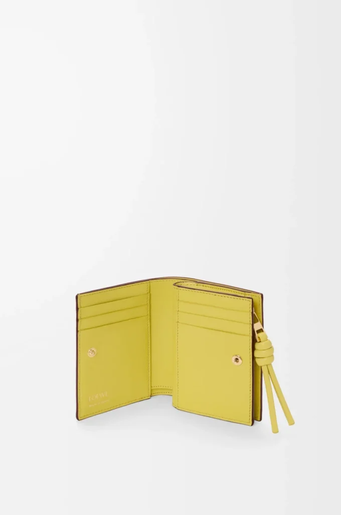 Knot compact wallet in shiny nappa calfskin Dark Burgundy/Light Citrine Knot compact wallet in shiny nappa calfskin Dark Burgundy/Light Citrine