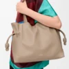 Large Flamenco clutch in nappa calfskin Sand