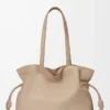 Large Flamenco clutch in nappa calfskin Sand