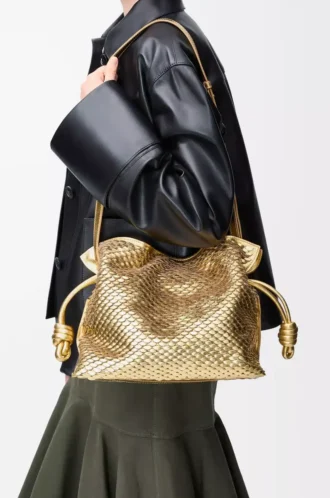 Medium Flamenco clutch in laminated lambskin Gold