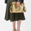 Medium Flamenco clutch in laminated lambskin Gold