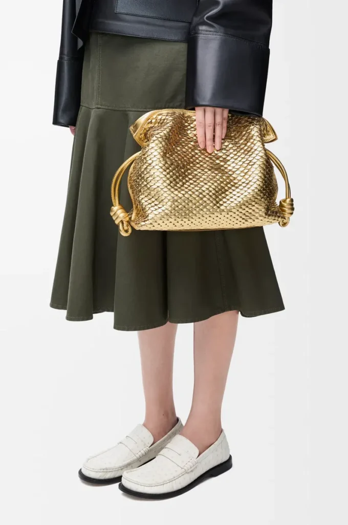 Medium Flamenco clutch in laminated lambskin Gold