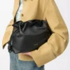 Medium Flamenco clutch in nappa calfskin Black
