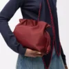 Medium Flamenco clutch in nappa calfskin Burnt Red