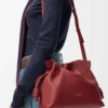 Medium Flamenco clutch in nappa calfskin Burnt Red