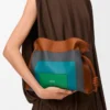 Medium Flamenco clutch in nappa calfskin Caramel/Bright Green