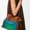 Medium Flamenco clutch in nappa calfskin Caramel/Bright Green