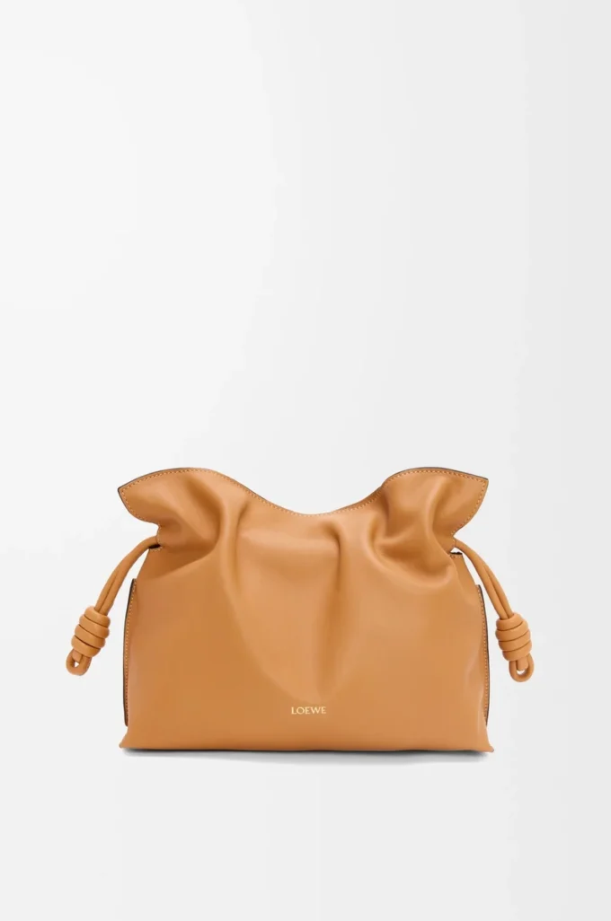 Medium Flamenco clutch in nappa calfskin Warm Desert