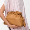 Medium Flamenco clutch in nappa calfskin Warm Desert
