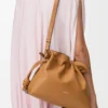 Medium Flamenco clutch in nappa calfskin Warm Desert