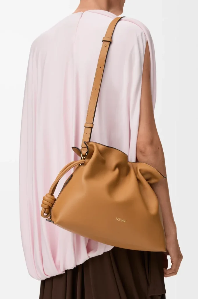 Medium Flamenco clutch in nappa calfskin Warm Desert