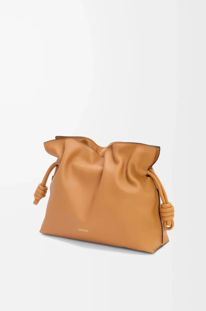 Medium Flamenco clutch in nappa calfskin Warm Desert