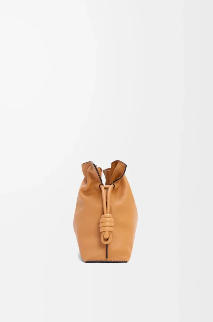 Medium Flamenco clutch in nappa calfskin Warm Desert