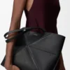 Medium horizontal Puzzle Fold tote in soft grained calfskin Black