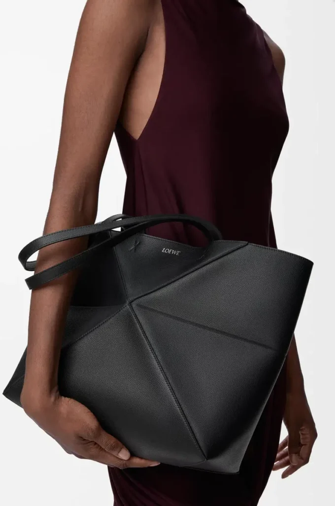 Medium horizontal Puzzle Fold tote in soft grained calfskin Black